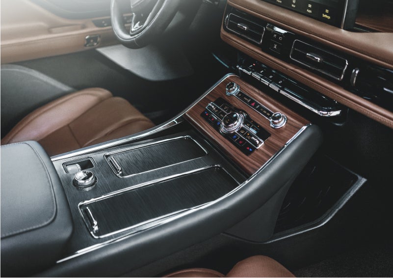 The front center console of a 2023 Lincoln Aviator® SUV is shown in | Bedford Lincoln PA in Bedford PA