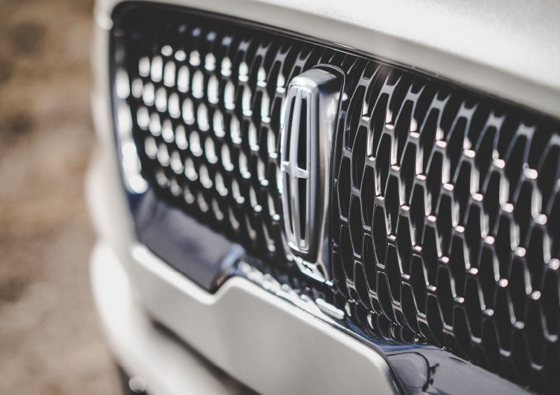 The grille of the 2024 Lincoln Aviator® Reserve model with an eye-catching repeated field of Lincoln Star logo shapes | Bedford Lincoln PA in Bedford PA