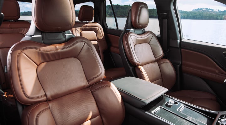 The front row's Perfect Position Seats in a 2024 Lincoln Aviator® Reserve model with Ebony Roast interior | Bedford Lincoln PA in Bedford PA
