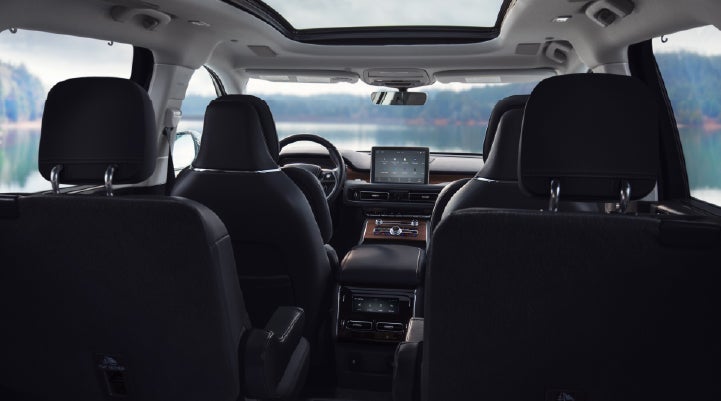 The interior of a 2024 Lincoln Aviator® SUV from behind the second row | Bedford Lincoln PA in Bedford PA