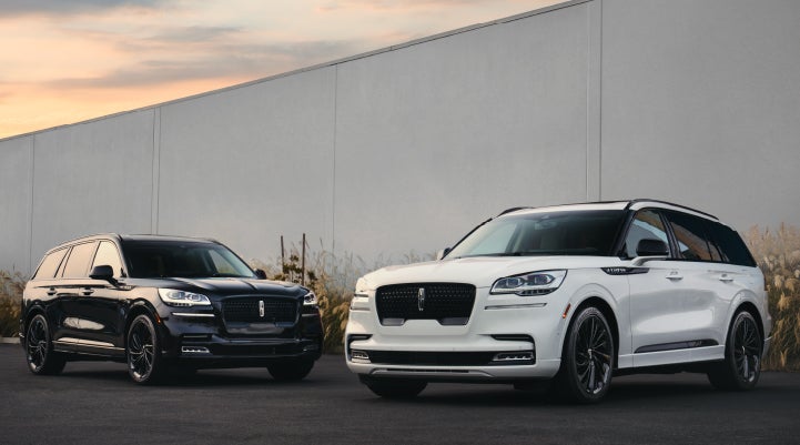 Two Lincoln Aviator® SUVs are shown with the available Jet Appearance Package | Bedford Lincoln PA in Bedford PA