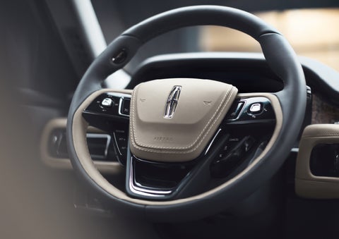 The intuitively placed controls of the steering wheel on a 2024 Lincoln Aviator® SUV | Bedford Lincoln PA in Bedford PA