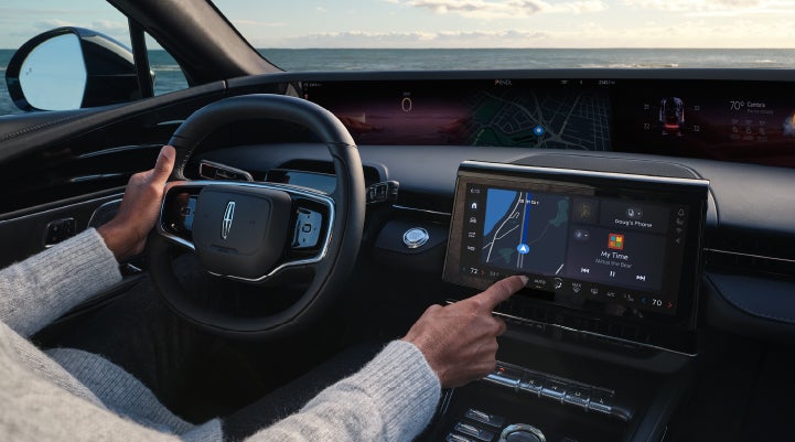 The driver of a 2024 Lincoln Nautilus® SUV interacts with the new Lincoln Digital Experience. | Bedford Lincoln PA in Bedford PA