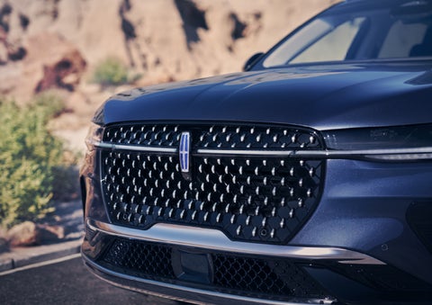 The stylish grille of a 2024 Lincoln Nautilus® SUV sparkles in the sunlight. | Bedford Lincoln PA in Bedford PA
