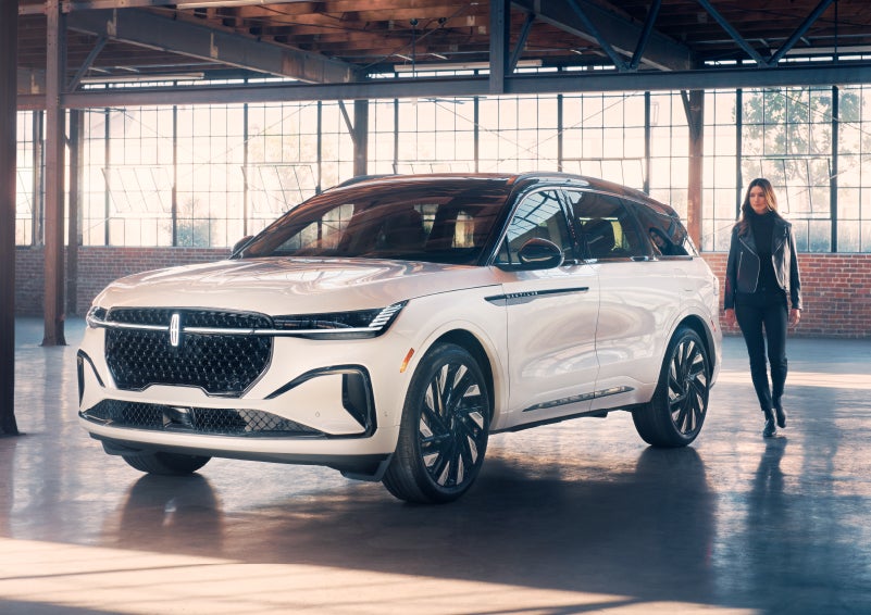 A person approaches a 2024 Lincoln Nautilus® SUV. | Bedford Lincoln PA in Bedford PA