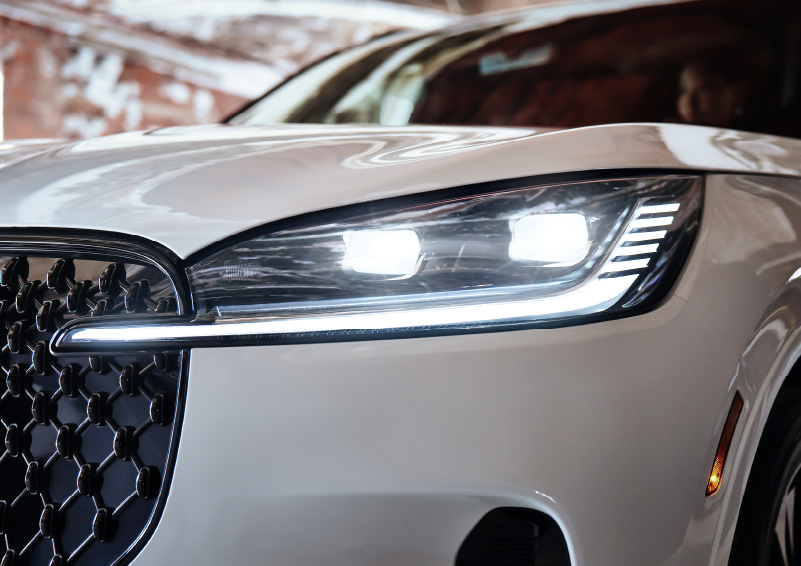 A close-up of a headlamp on the 2025 Lincoln Aviator® SUV is shown. | Bedford Lincoln PA in Bedford PA