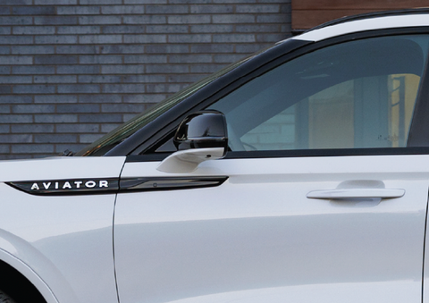 The driver’s door of a white 2025 Lincoln Aviator® SUV is showcased. | Bedford Lincoln PA in Bedford PA