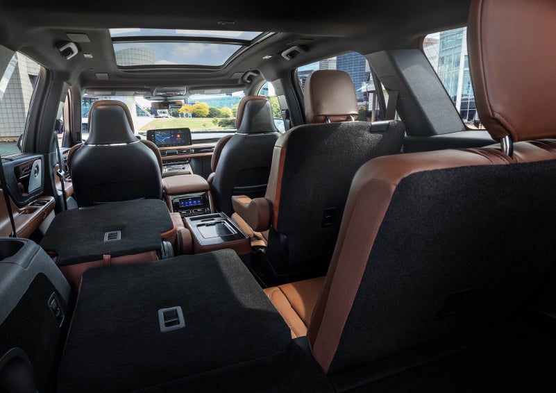 The interior of the 2025 Lincoln Aviator® SUV is shown with two seats folded down for added space. | Bedford Lincoln PA in Bedford PA