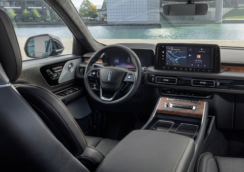 The interior of the 2025 Lincoln Aviator® SUV is shown parked with a view of a harbor through the windshield. | Bedford Lincoln PA in Bedford PA