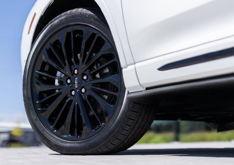 A stylish 20-inch black aluminum wheel of the available Jet Appearance Package is shown. | Bedford Lincoln PA in Bedford PA