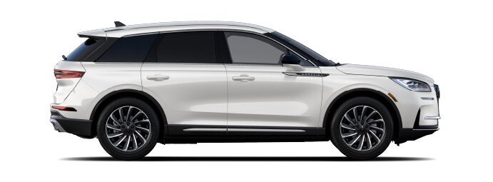 The passenger side of a Lincoln Corsair® SUV is shown in the Ceramic Pearl extra-cost exterior paint option. | Bedford Lincoln PA in Bedford PA