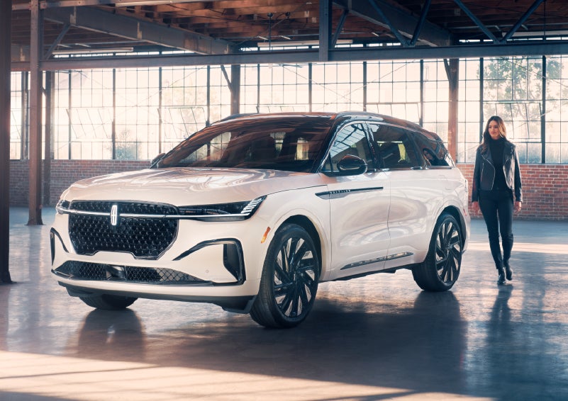 A person approaches a 2025 Lincoln Nautilus® SUV. | Bedford Lincoln PA in Bedford PA