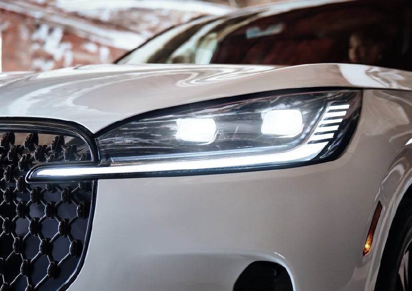 A close-up of a headlamp on the 2026 Lincoln Aviator® SUV is shown. | Bedford Lincoln PA in Bedford PA