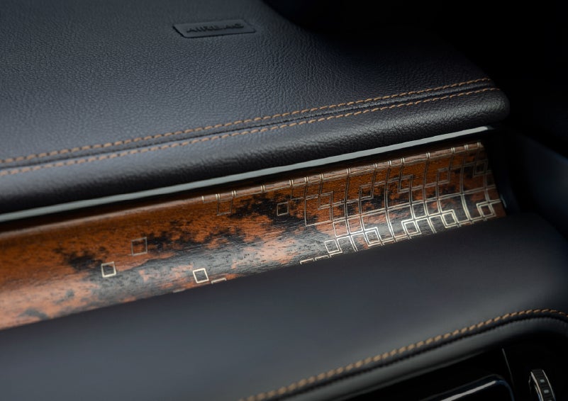 A close-up shot of the 2026 Lincoln Aviator® dashboard with unique black and brown accents and brown stitching. | Bedford Lincoln PA in Bedford PA