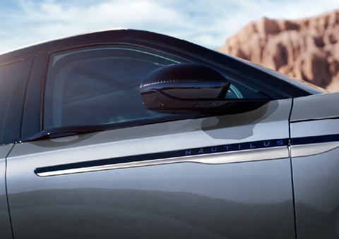 Blue lettering on the side of the vehicle that reads Nautilus indicates the available Hybrid Powertrain. | Bedford Lincoln PA in Bedford PA