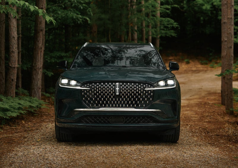 The front grille of a 2027 Lincoln Aviator® Black Label™ SUV is shown. | Bedford Lincoln PA in Bedford PA
